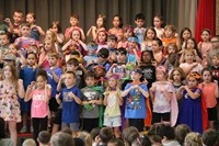 students participating in first grade show