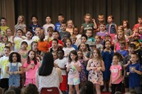 students participating in first grade show