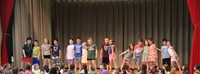 students participating in first grade show