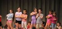 students participating in first grade show