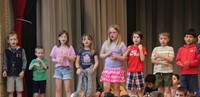 students participating in first grade show
