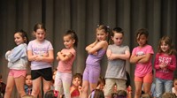 students participating in first grade show