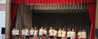 students participating in first grade show