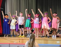 students participating in first grade show