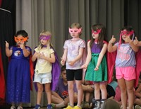 students participating in first grade show