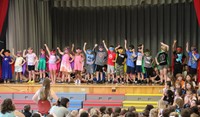 students participating in first grade show