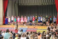 students participating in first grade show