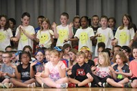 students participating in first grade show