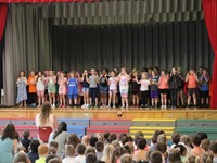 students participating in first grade show