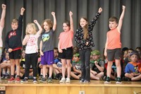 students participating in first grade show