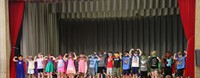 students participating in first grade show