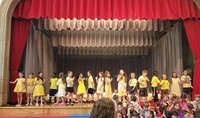 students participating in first grade show