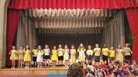students participating in first grade show
