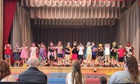 students participating in first grade show