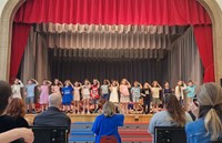 students participating in first grade show