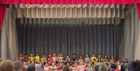 students participating in first grade show