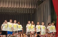 students participating in first grade show