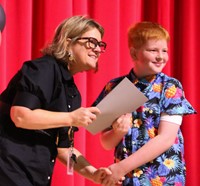 people at fifth grade moving up ceremony