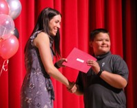 people at fifth grade moving up ceremony