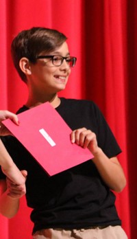 people at fifth grade moving up ceremony