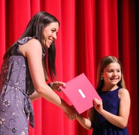 people at fifth grade moving up ceremony