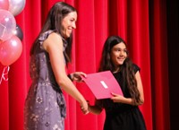 people at fifth grade moving up ceremony
