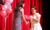 people at fifth grade moving up ceremony