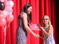 people at fifth grade moving up ceremony