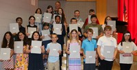 people at fifth grade moving up ceremony