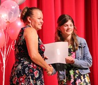 people at fifth grade moving up ceremony