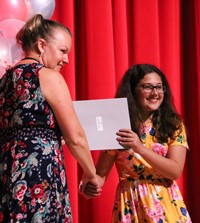 people at fifth grade moving up ceremony