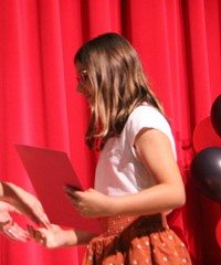 people at fifth grade moving up ceremony