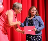 people at fifth grade moving up ceremony