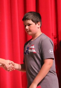 people at fifth grade moving up ceremony