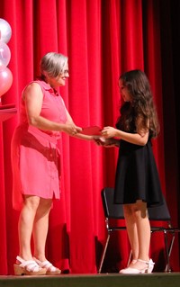 people at fifth grade moving up ceremony