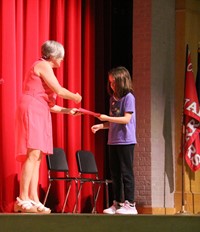 people at fifth grade moving up ceremony
