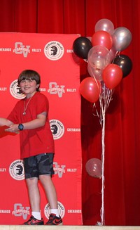 people at fifth grade moving up ceremony