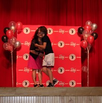 people at fifth grade moving up ceremony