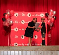 people at fifth grade moving up ceremony