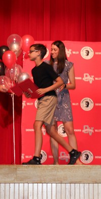 people at fifth grade moving up ceremony