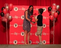 people at fifth grade moving up ceremony