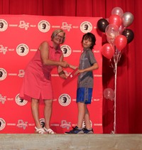 people at fifth grade moving up ceremony