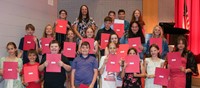 people at fifth grade moving up ceremony