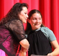 people at fifth grade moving up ceremony