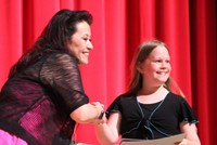 people at fifth grade moving up ceremony