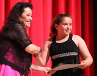 people at fifth grade moving up ceremony