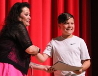 people at fifth grade moving up ceremony