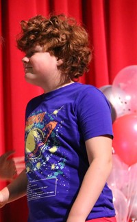 people at fifth grade moving up ceremony