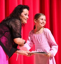 people at fifth grade moving up ceremony