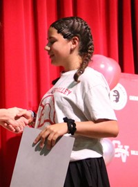 people at fifth grade moving up ceremony
